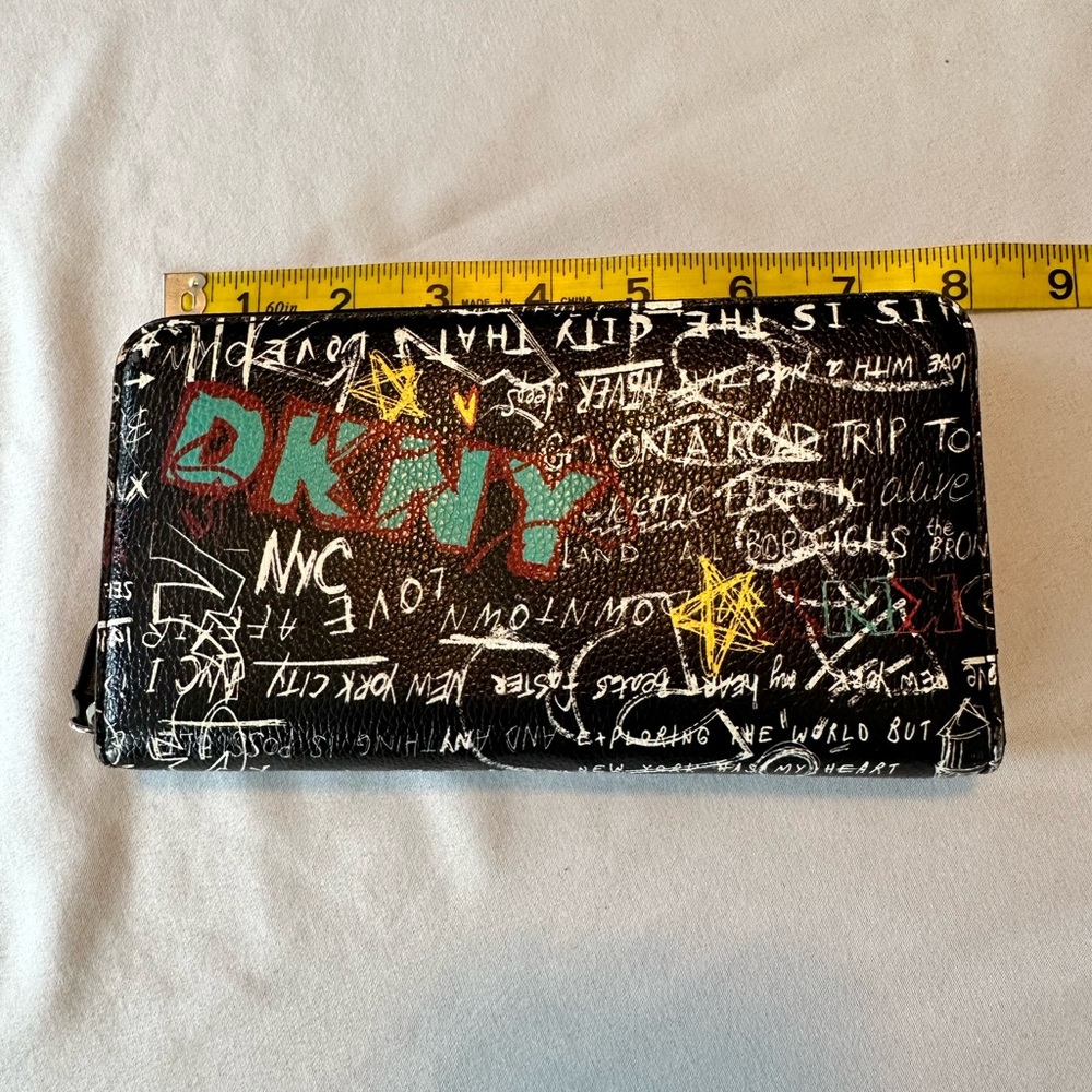 DKNY Vela Graffiti Wallet. Zip around.